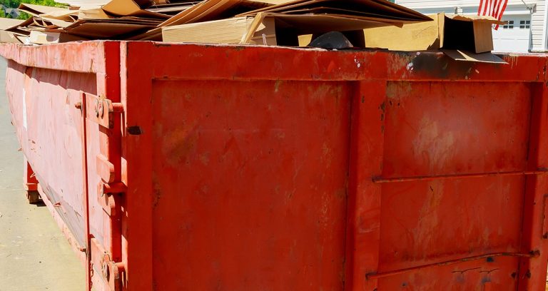 A red waste bin.