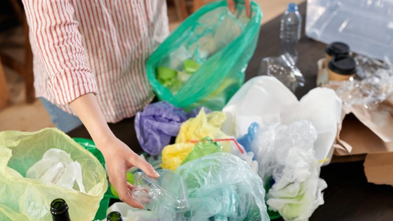 Woman sorting recycling