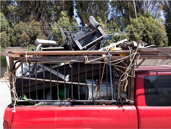 A truck bed filled with scrap